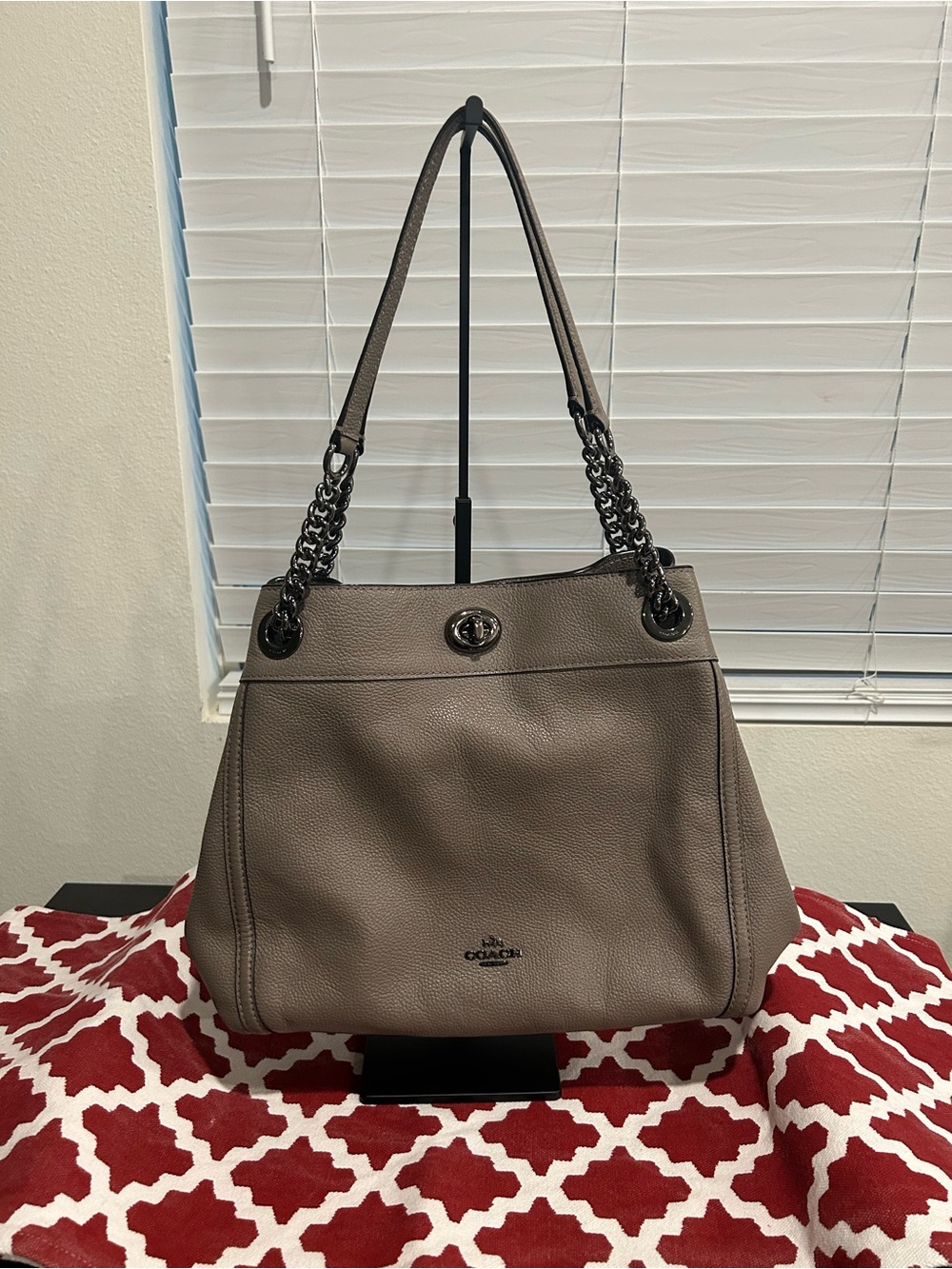 Coach Pebbled Leather Edie Turn Lock Shoulder Bag in Grayish Taupe.